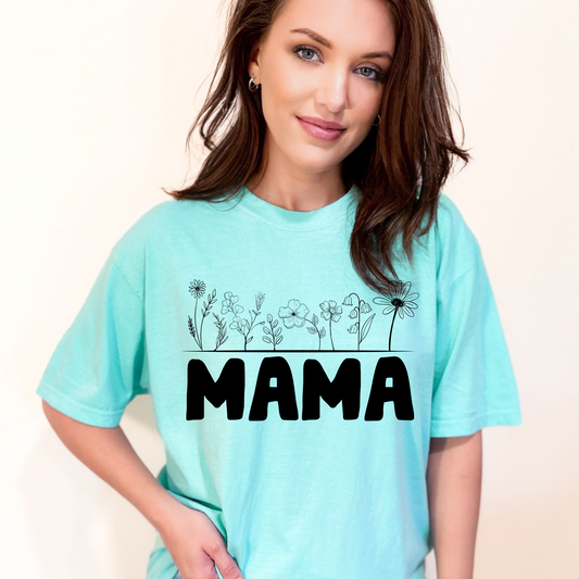 Woman wearing a t-shirt that says MAMA. 